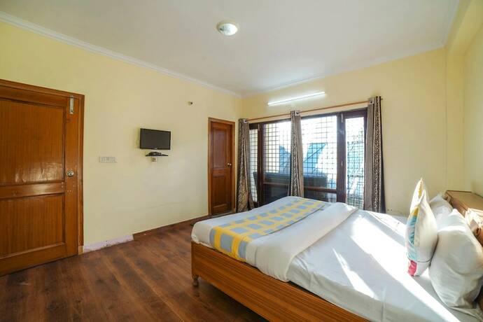 Imagen de la habitación del Hotel Goroomgo You and Me Mallital Nainital. Foto 19