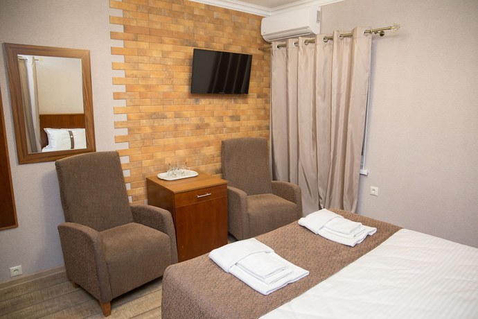 Imagen de la habitación del Hotel Gostinyi Dvor. Foto 3