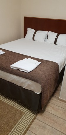 Imagen de la habitación del Hotel Gostinyi Dvor. Foto 5