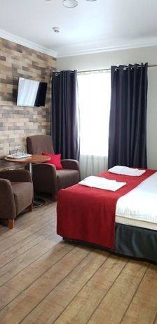 Imagen de la habitación del Hotel Gostinyi Dvor. Foto 19