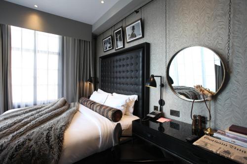 Imagen de la habitación del Hotel Gotham. Foto 15