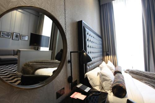 Imagen de la habitación del Hotel Gotham. Foto 16