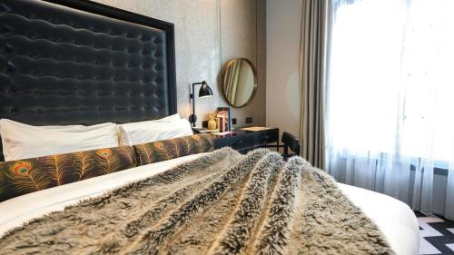 Imagen de la habitación del Hotel Gotham. Foto 17