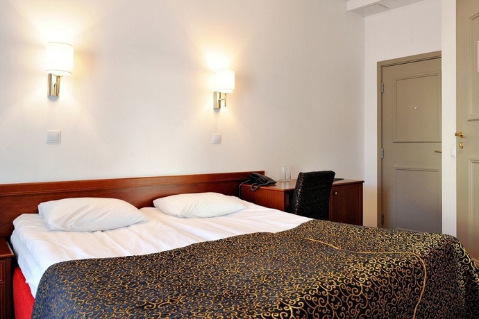 Imagen de la habitación del Hotel Gotthard Residence. Foto 8