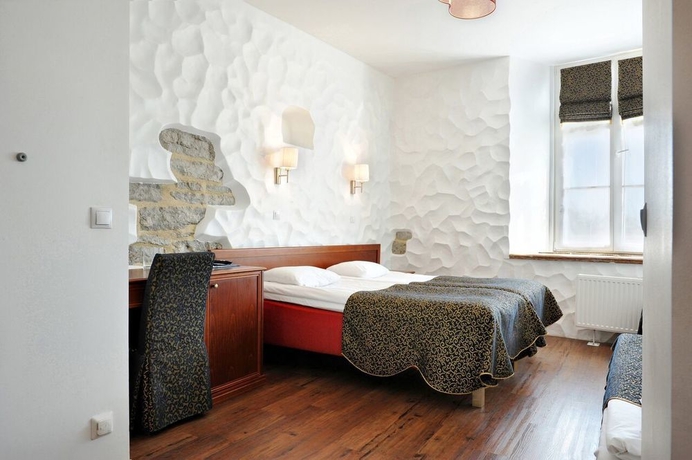 Imagen de la habitación del Hotel Gotthard Residence. Foto 9