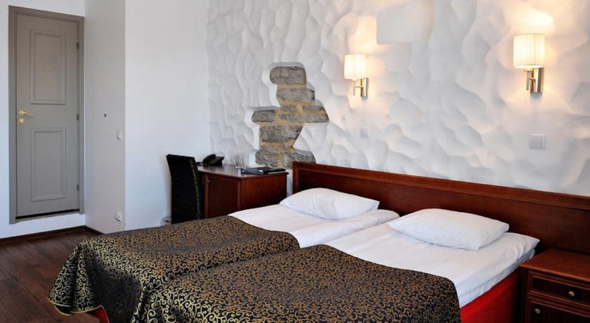 Imagen de la habitación del Hotel Gotthard Residence. Foto 12