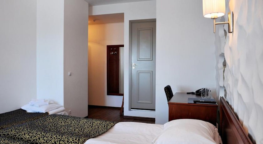 Imagen de la habitación del Hotel Gotthard Residence. Foto 13