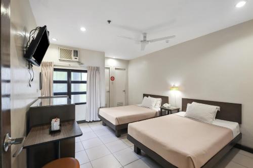 Imagen de la habitación del Hotel Governor Forbes Inn - Manila City Center. Foto 18