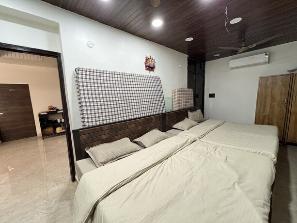 Imagen de la habitación del Hotel Govindam Royal Stay. Foto 24