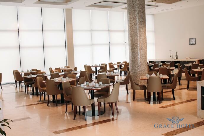 Imagen del bar/restaurante del Hotel Grace Hotel. Foto 9