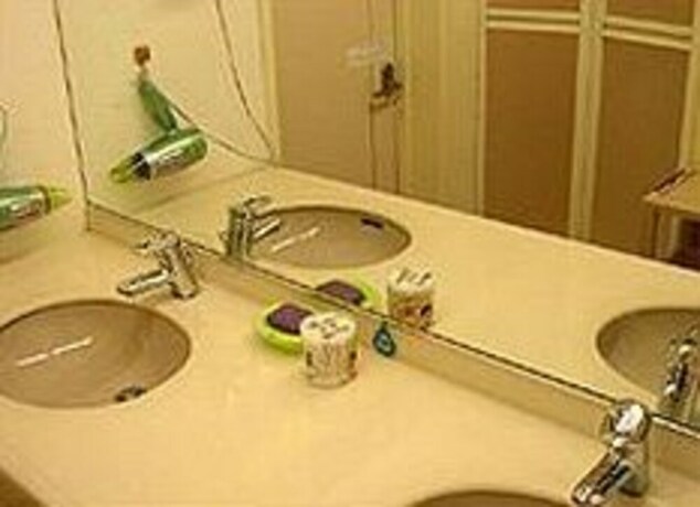Imagen de la habitación del Hotel Grace Naha. Foto 16