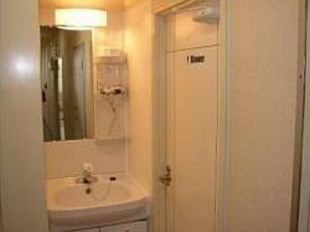 Imagen de la habitación del Hotel Grace Naha. Foto 19
