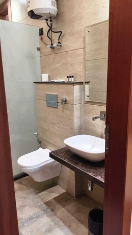 Imagen de la habitación del Hotel Grace Suites. Foto 12