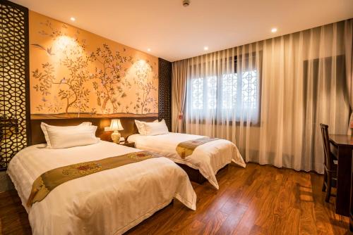 Imagen de la habitación del Hotel Graceland Garden Court. Foto 7