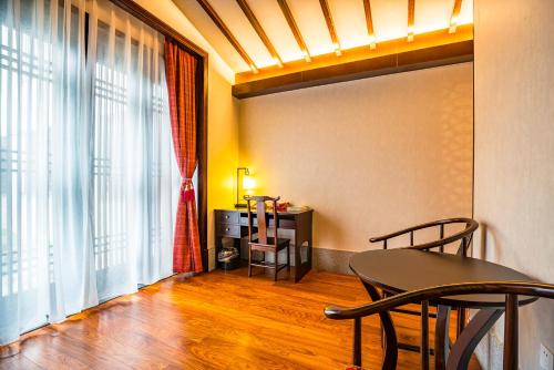 Imagen de la habitación del Hotel Graceland Garden Court. Foto 9