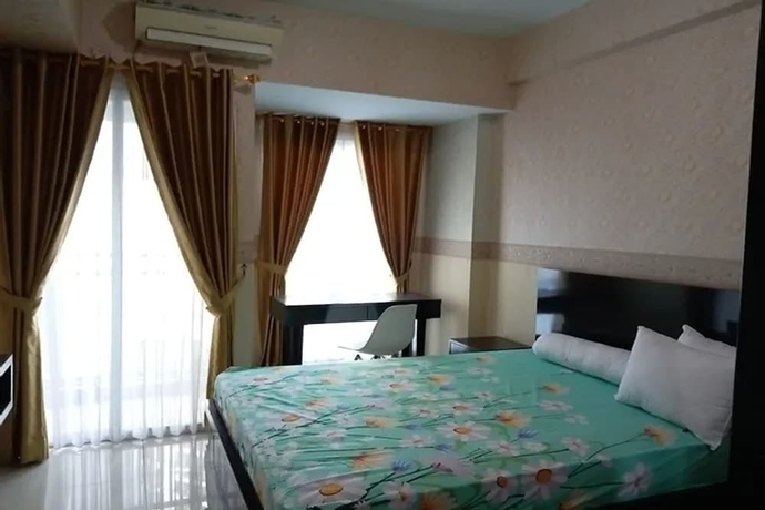 Imagen de la habitación del Hotel Gracia Room Apartemen Grand Dhika City Bekasi. Foto 2
