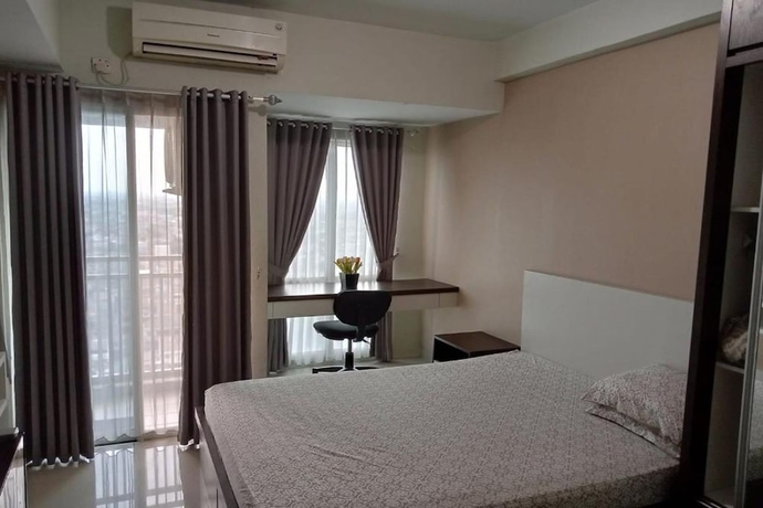 Imagen de la habitación del Hotel Gracia Room Apartemen Grand Dhika City Bekasi. Foto 3