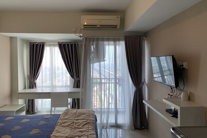 Imagen de la habitación del Hotel Gracia Room Apartemen Grand Dhika City Bekasi. Foto 4