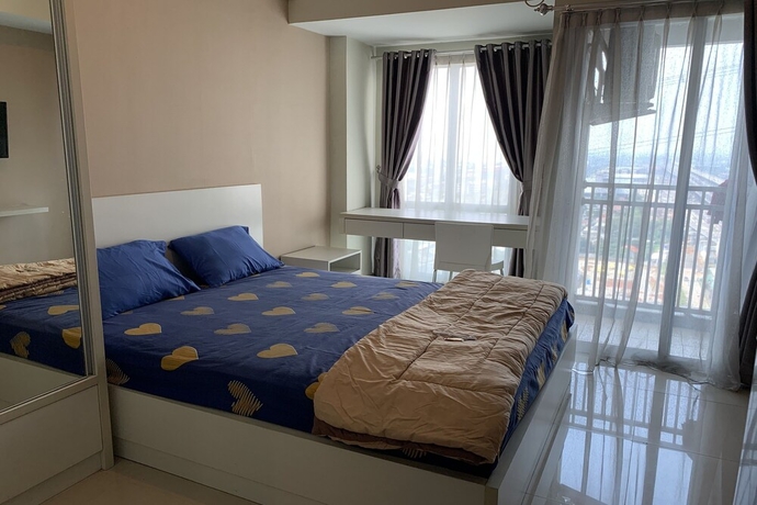 Imagen de la habitación del Hotel Gracia Room Apartemen Grand Dhika City Bekasi. Foto 7