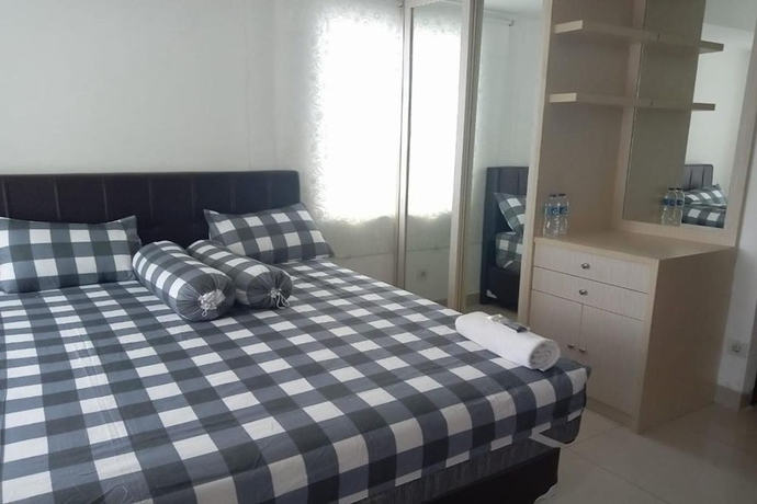 Imagen de la habitación del Hotel Gracia Room Apartemen Grand Dhika City Bekasi. Foto 8