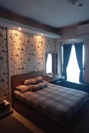 Imagen de la habitación del Hotel Gracia Room Apartemen Grand Dhika City Bekasi. Foto 11