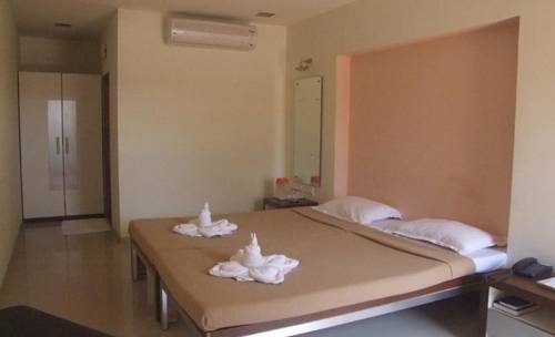 Imagen de la habitación del Hotel Graciano Cottages. Foto 8