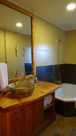 Imagen de la habitación del Hotel Gracias A La Vida Lodge. Foto 16