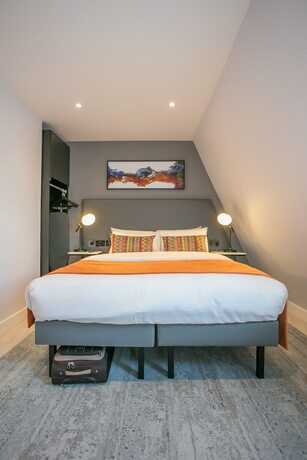 Imagen de la habitación del Hotel Grafton Street Studios. Foto 15