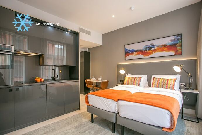Imagen de la habitación del Hotel Grafton Street Studios. Foto 19