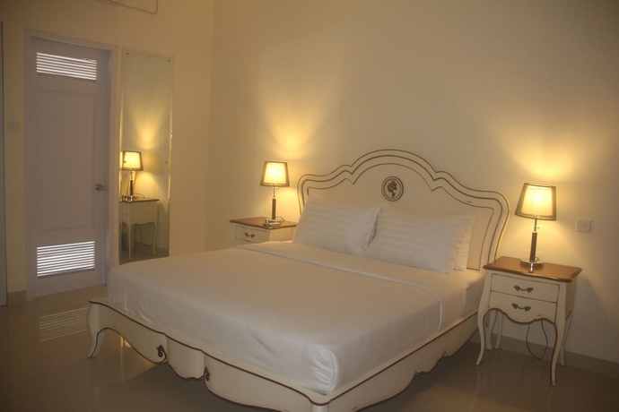 Imagen de la habitación del Hotel Graha Ayu. Foto 4