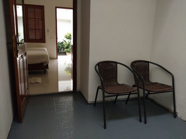 Imagen de la habitación del Hotel Graha Kinasih Kotabaru. Foto 22