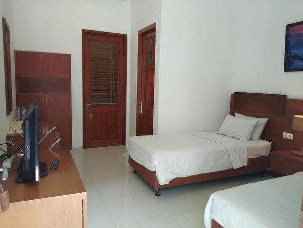 Imagen de la habitación del Hotel Graha Kinasih Kotabaru. Foto 24