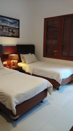 Imagen de la habitación del Hotel Graha Kinasih Kotabaru. Foto 29