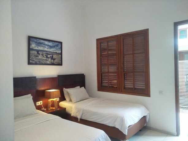 Imagen de la habitación del Hotel Graha Kinasih Kotabaru. Foto 30