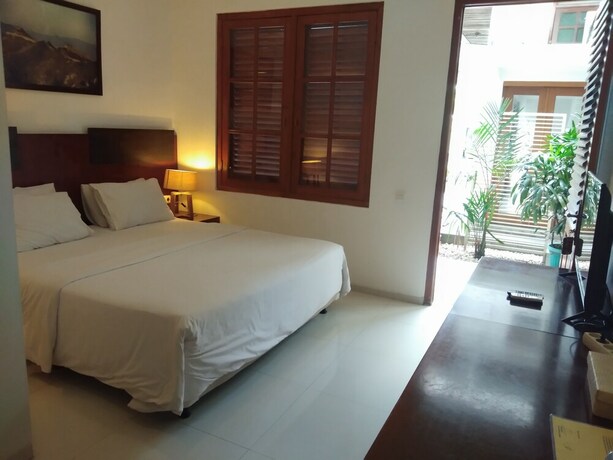 Imagen de la habitación del Hotel Graha Kinasih Kotabaru. Foto 33