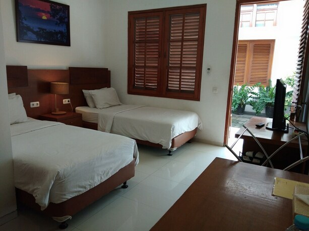Imagen de la habitación del Hotel Graha Kinasih Kotabaru. Foto 34