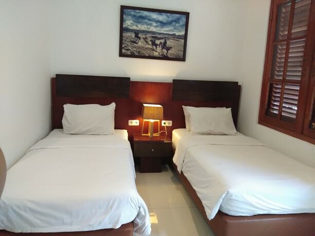 Imagen de la habitación del Hotel Graha Kinasih Kotabaru. Foto 36