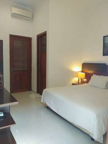 Imagen de la habitación del Hotel Graha Kinasih Kotabaru. Foto 38
