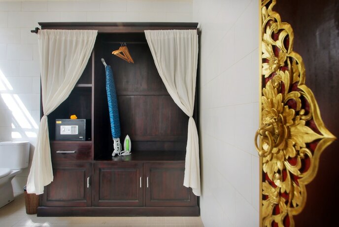 Imagen de la habitación del Hotel Graha Madesimon. Foto 18