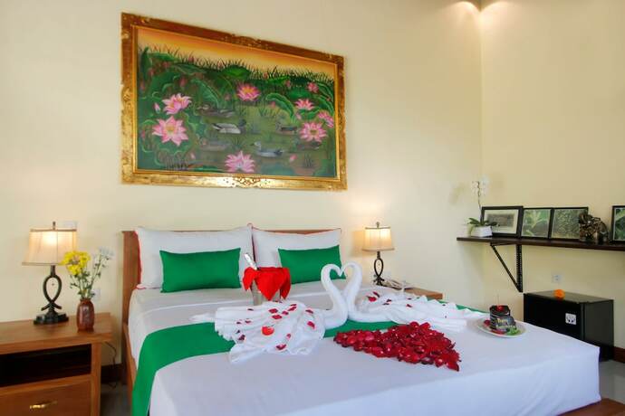 Imagen de la habitación del Hotel Graha Madesimon. Foto 19