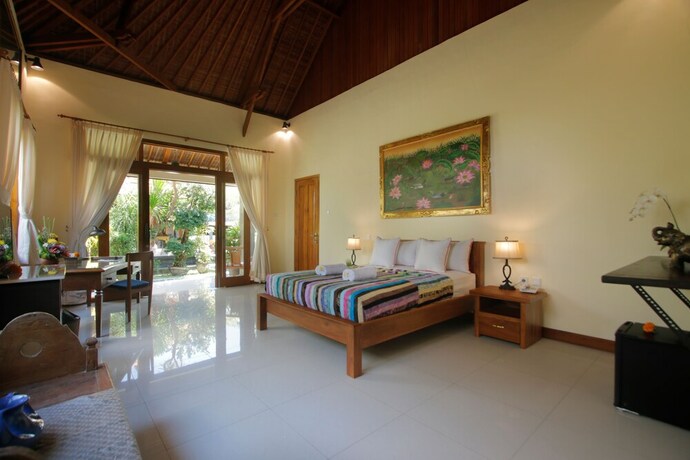 Imagen de la habitación del Hotel Graha Madesimon. Foto 20