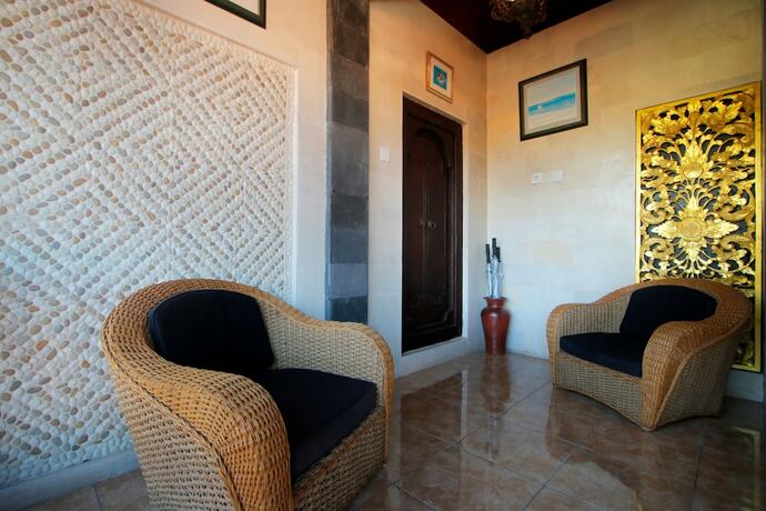 Imagen de la habitación del Hotel Graha Madesimon. Foto 22