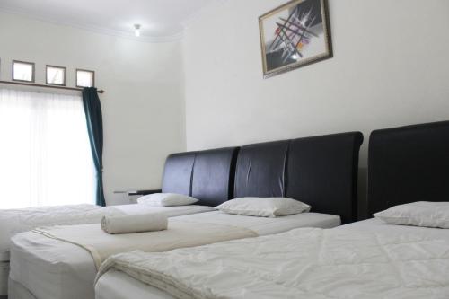 Imagen de la habitación del Hotel Graha Pertiby. Foto 6