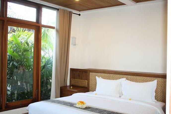 Imagen de la habitación del Hotel Graha Sandat Villas By Pramana Villas - Chse Certified. Foto 17