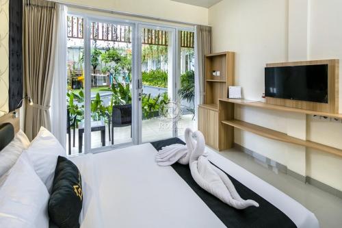 Imagen de la habitación del Hotel Graha Socio Nusa Dua Bali. Foto 18