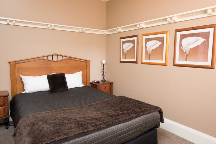Imagen de la habitación del Hotel Graham Apartments. Foto 13