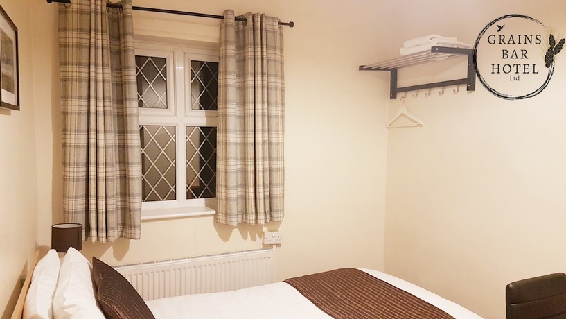 Imagen de la habitación del Hotel Grains Bar. Foto 15