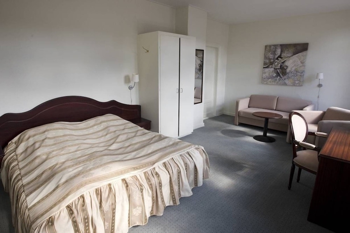 Imagen de la habitación del Hotel Gram Slotskro. Foto 7