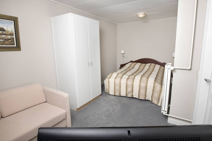 Imagen de la habitación del Hotel Gram Slotskro. Foto 10