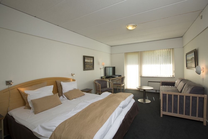 Imagen de la habitación del Hotel Gram Slotskro. Foto 11